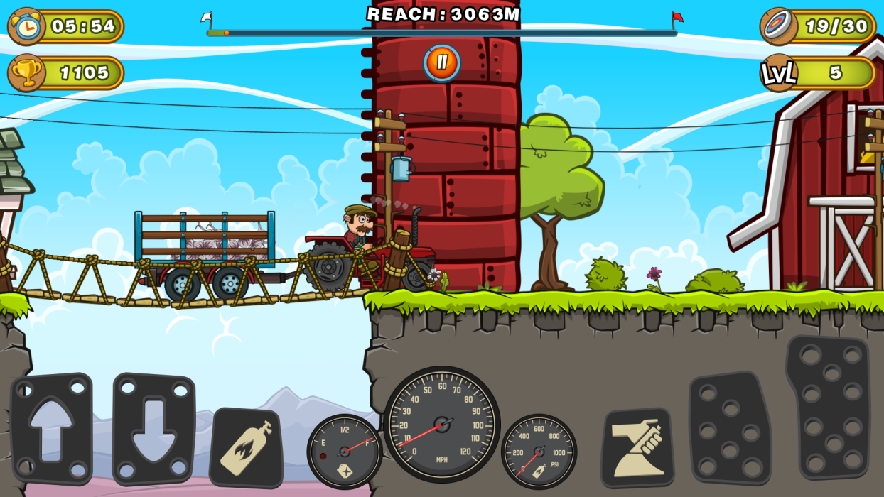 Tractor Mania tractor towing a loaded trailer across a rope bridge